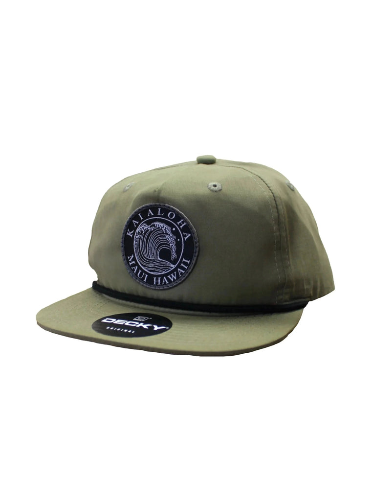 Green hat with braided embroidery near the cap. Black wave logo patch on the front with writing "KaiAloha Maui Hawaii". Black island flag label on the back.